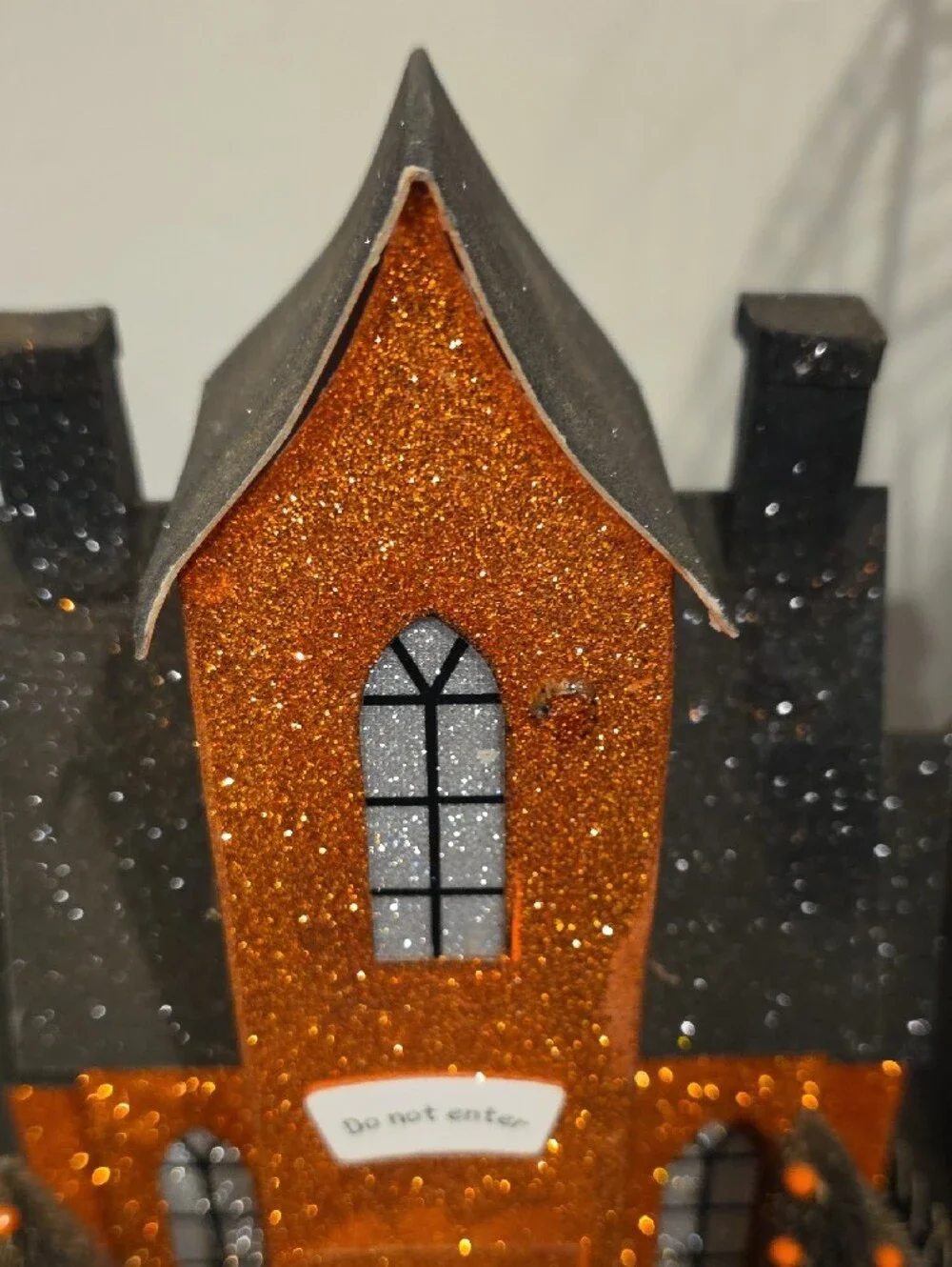 Glittery Orange & Black Haunted House Décor